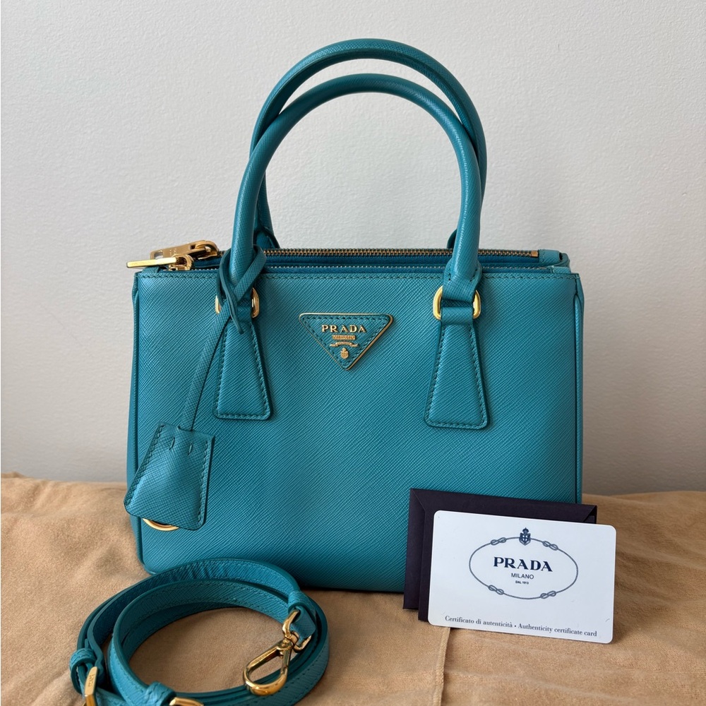 Prada Turquoise Saffiano Lux Leather. Small with sling in gold hardware